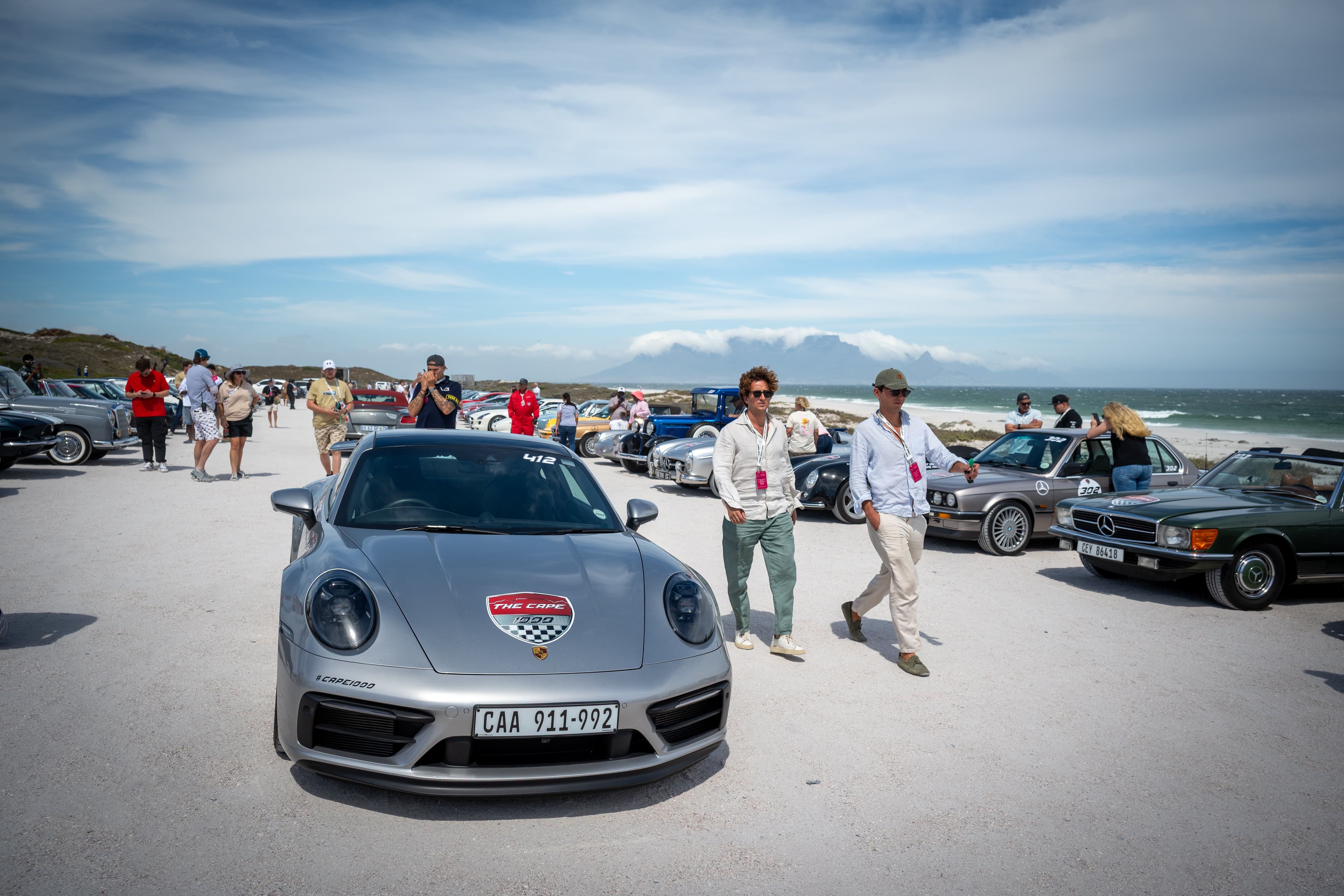 The Cape 1000 gathering beside the coast with Table Mountain in the distance.