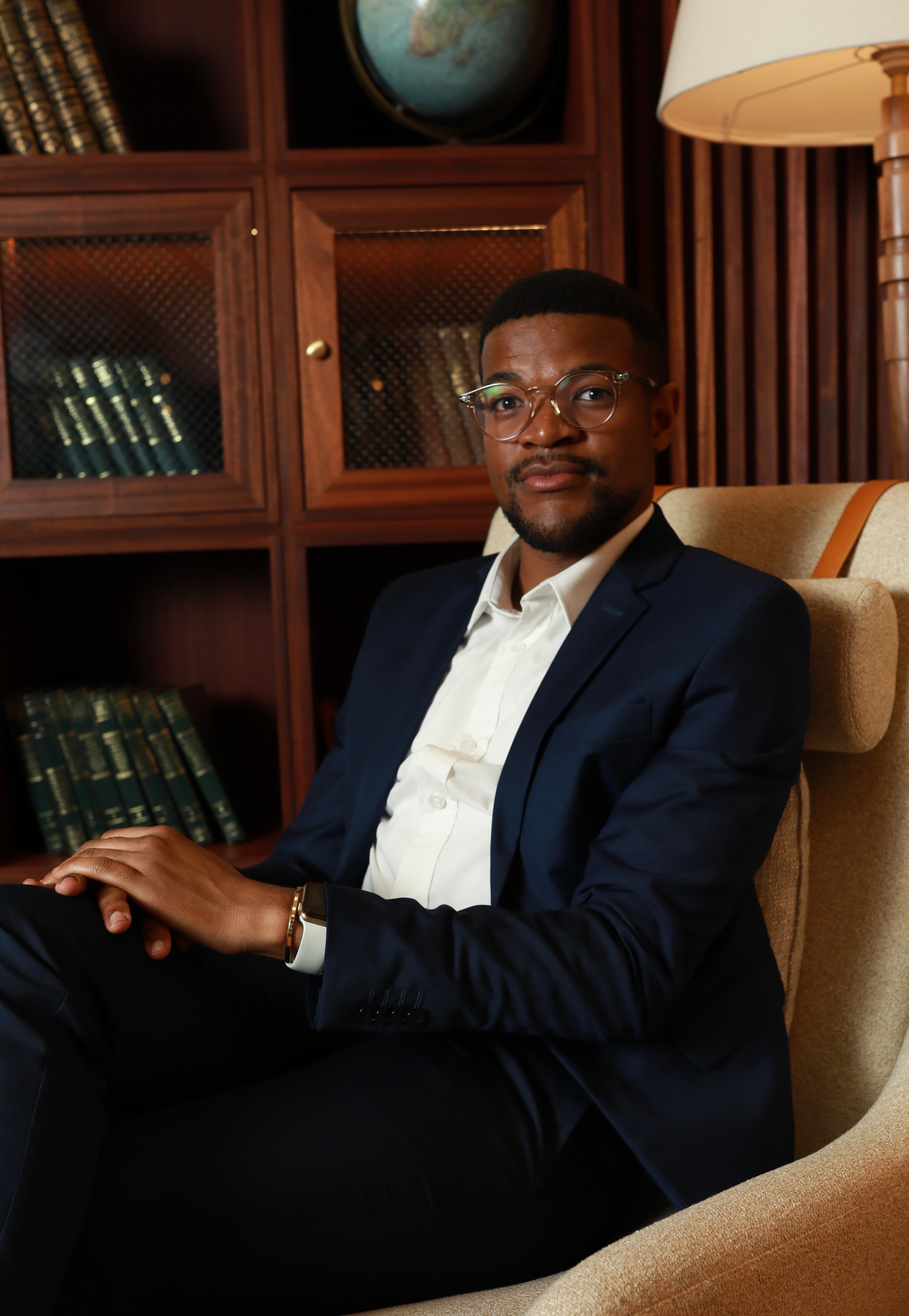 A Standard Bank professional portrait in a private members environment.