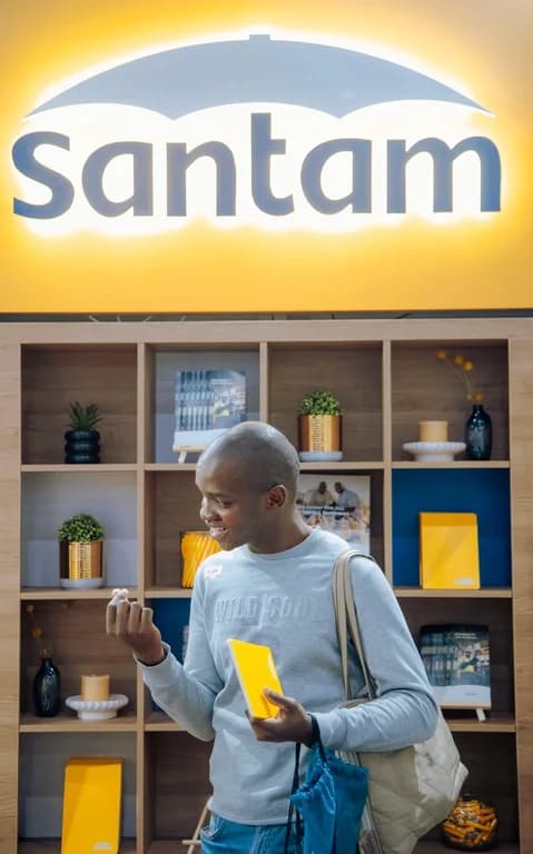 An attendee engaging with the Santam exhibition at The Business Show Africa 2026